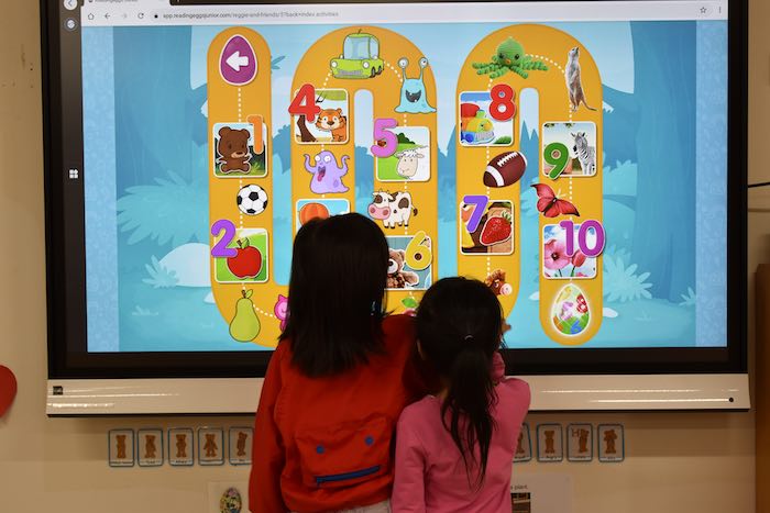 Touch screen activities in preschool room